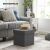 Songmics dark grey storage ottoman used as footrest in living room