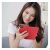 Woman using SAMSUNG Galaxy A15 Red Book Case