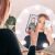 Woman taking selfie in Humanas HS-HM03 LED makeup mirror