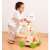 Child playing with New Classic Toys Activity Walker, wooden walker with activity panel, educational toy for babies