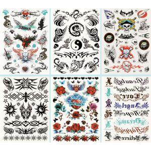 Toi-Toys temporary tattoo sheet with skulls, eagles, roses, and tribal designs. - Tattoo