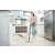 Woman using Kärcher SC 2 EasyFix steam cleaner to clean kitchen floor