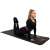 Woman doing yoga on a Springos exercise mat