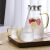Quasar & Co. glass teapot set with 4 cups, borosilicate glass and stainless steel filter, serving tea