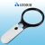 IZOXIS LED magnifying glass on blue background