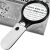 IZOXIS LED magnifying glass in use reading newspaper
