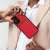 Person holding red NOBLE tok SAMSUNG S24 phone case