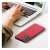 Person using laptop with red NOBLE tok SAMSUNG S24 phone case on desk