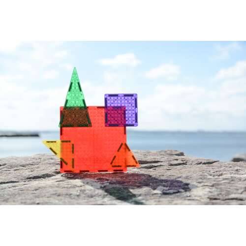 Magbrix magnetic building tiles in use, creating a structure with different shapes