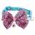Pink leopard print bowtie with bell attached to blue dog and cat collar with paw prints and bones