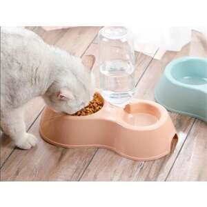Cat drinking from a pink double bowl with dispenser for food and water - Pet Feeding and Water Bowl