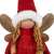 Close-up of the face and wings of a red Christmas fairy figurine with gold wings