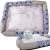 Cat bed with scratching surface, size S, blue and white pattern, cat sleeping on it