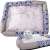 Cat bed with scratching surface, size S, blue and white pattern, cat sleeping on it