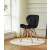 ModernHome black velvet dining chair with wooden legs in a living room setting