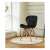 Modernhome black velvet dining chair with wooden legs in a dining room setting
