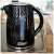 Eldom C260 1.7L Black Kettle with Water Level Indicator and Triple Safety System, in a kitchen setting