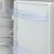 Close-up of Beko BCNA306E4SN refrigerator door shelves