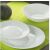 Luminarc Harena white plates and bowl on green background
