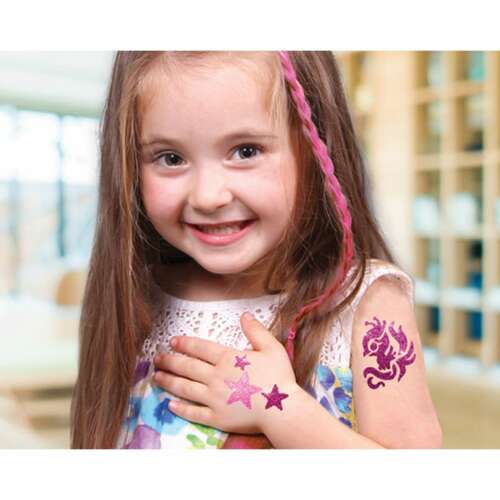 Girl with TYTOO Glitter Tattoos: Phoenix and Stars