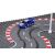 Blue electric slot car on the racetrack