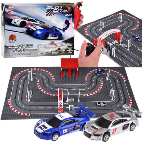 Slot City electric race track with two cars and remote controls
