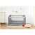 RicoKids travel cot with mattress, light gray, in a home setting