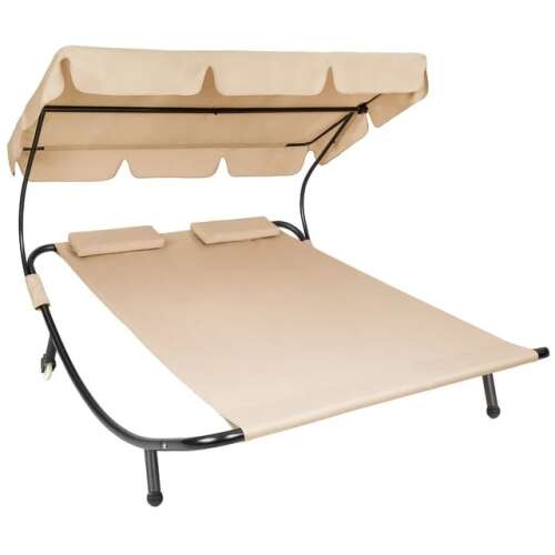 Angled view of Pepita beige double sun lounger with canopy and pillows