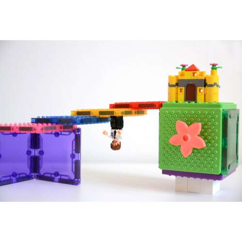 Magbrix mágneses építőkockákból épített vár Lego figurákkal