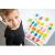 Child playing with New Classic Toys lowercase letter puzzle
