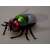 Close-up of remote control fly toy with red glowing eyes