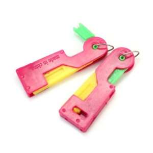 2 pack of automatic needle threaders, pink and yellow plastic, made in China - Art & Craft