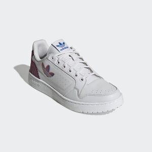 Adidas NY 90 white casual shoes for men, angled view - Fashion & Clothing