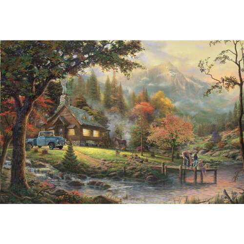Kész Schmidt Puzzle Thomas Kinkade Peaceful Moment 500 darabos, amely egy festői tájat ábrázol kabinnal, folyóval és hegyekkel