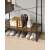 VASAGLE garment rack with shoe shelf, 5 shelves, 6 side hooks, rustic brown and black, close-up of bottom shelf