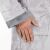 Close-up of pocket and sleeve of gray hooded terry cloth robe