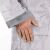 Close-up of pocket and sleeve of gray hooded terry cloth robe
