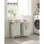 VASAGLE 2-compartment laundry hamper with shelf, white, in a bathroom setting
