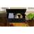 Black garden storage box with cushions and garden tools inside
