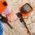 Person using Cobra Tector RUSH metal detector on the beach