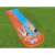 Kids sliding on Bestway H2Go Double Water Slide in summer