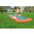 Children having fun sliding down a Bestway H2GO water slide