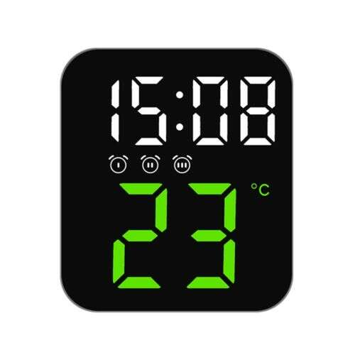 Digital LED alarm clock with green display showing time and temperature