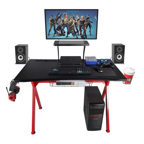 Red and black gaming desk with monitor stand, headphone hook, and cup holder