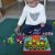 Child playing with Gyermek Puzzle - Gomb Mozaik, improving concentration