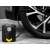 Tracer TRAKOM47149 car tire inflator in use, inflating a car tire