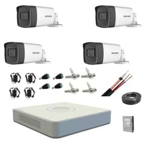 Hikvision 4-channel 1080p CCTV security camera system with 4 cameras, 1TB hard drive, power supplies, cables, and connectors - Hikvision Security Camera