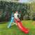 Child playing on the Dolu Big Water Slide in the garden