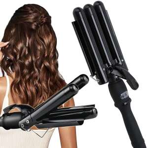 Woman with wavy hair using a black triple barrel curling iron - Hair curler