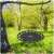 Neo-Sport SWINGO Nest Swing 120cm - Black hanging from a tree branch